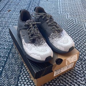 Salomon running shoes.